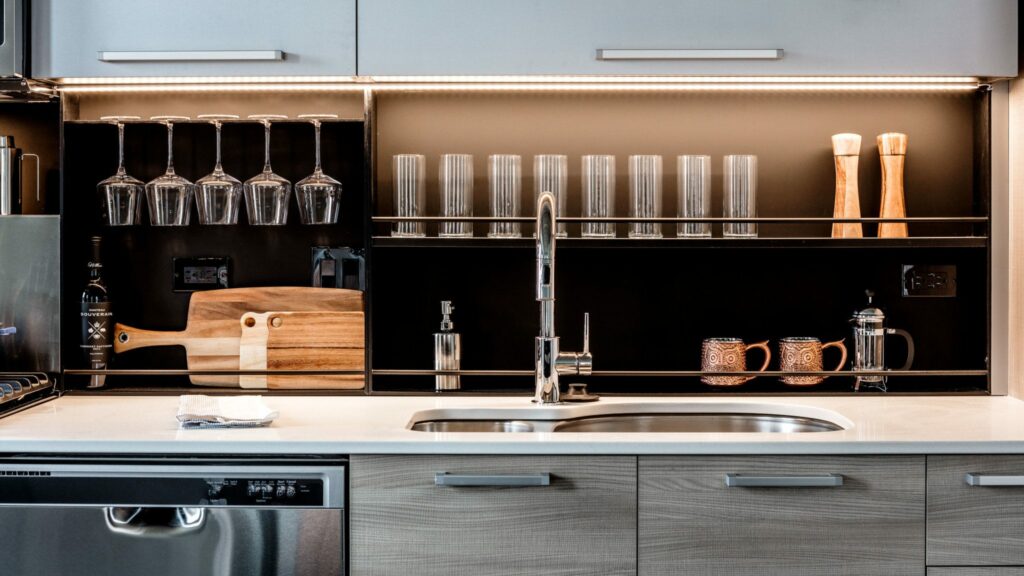 Seven 10 West's custom backsplash with open shelving.